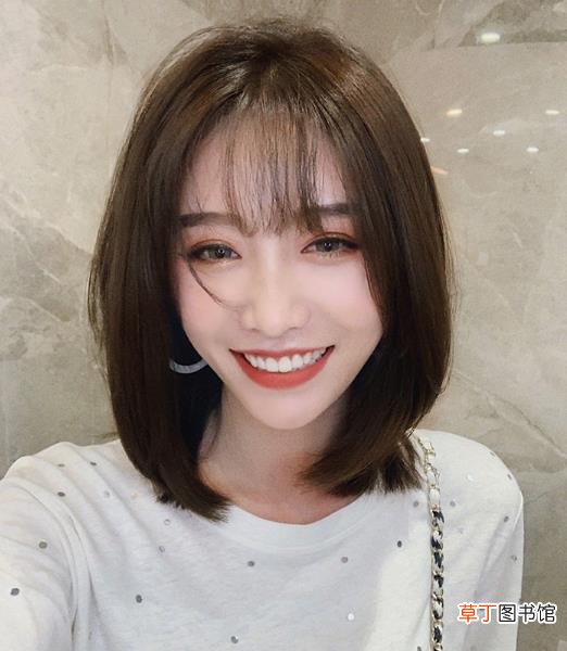 短发内扣怎么扎丸子头
